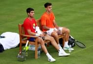 Alcaraz pictured with Cerundolo (R) at the 2023 Queen's Club Championships - Image Source: Getty